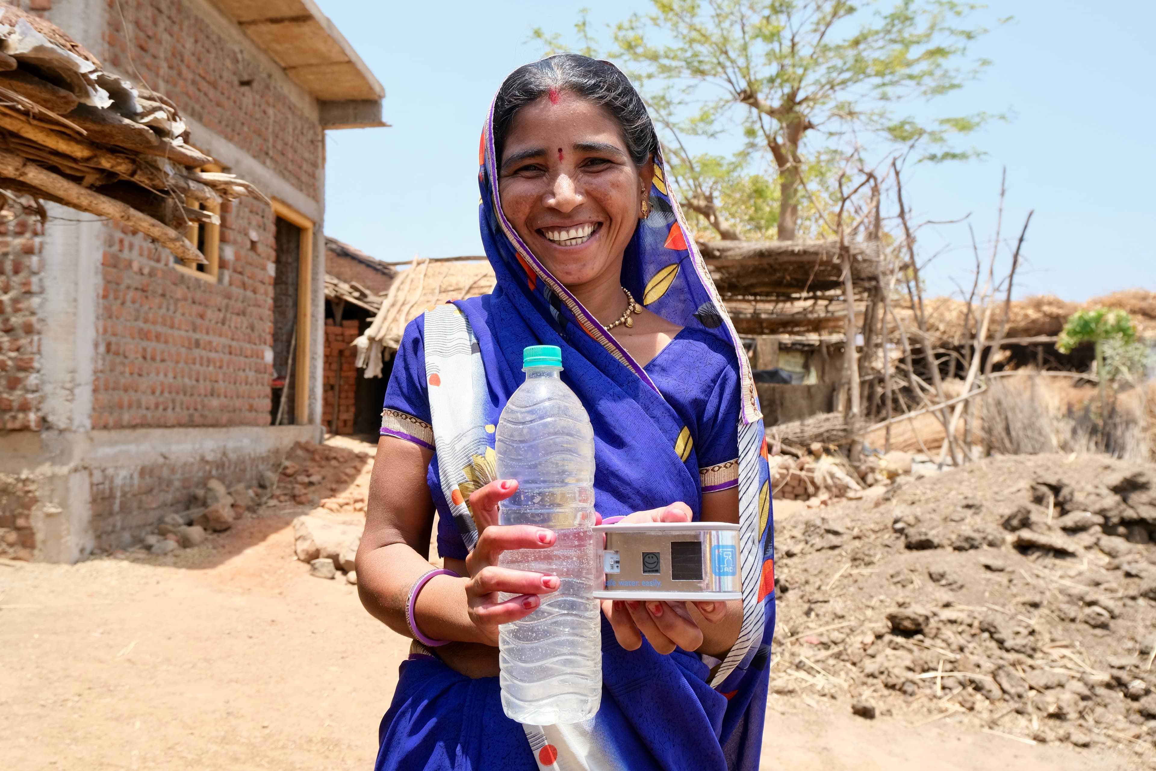 An image of Water purification with Solar WADI devices in India